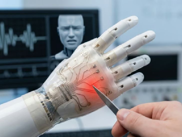 Hong Kong Scientists Develop E-Skin for Robots That Feels Pain & Triggers Human-Like Reflexes | रोबोट को भी अब दर्द महसूस होगा: चीन के वैज्ञानिकों ने बनाई इंसानों जैसी ई-स्किन, चोट लगने पर तुरंत हाथ हटाएगा