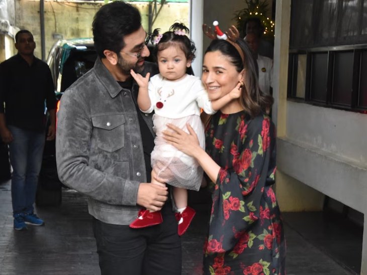 आलिया भट्ट और रणबीर कपूर अपनी बेटी राहा के साथ।